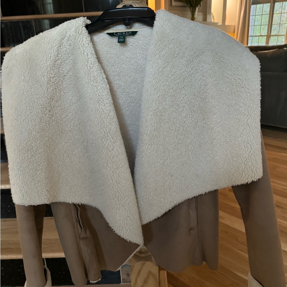 Ralph Lauren’s women’s crop jacket with fur collar size small.